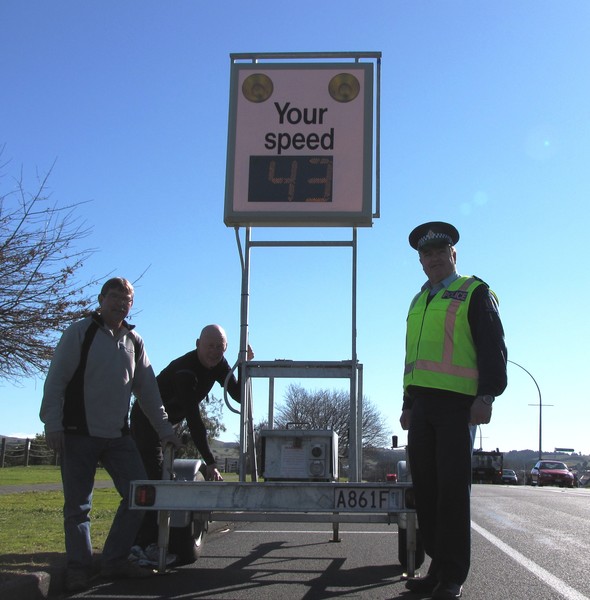 Graham Frederick and John Church of the Taupo Community Patrol with Grant Tullock, Community Constable, Taupo Police